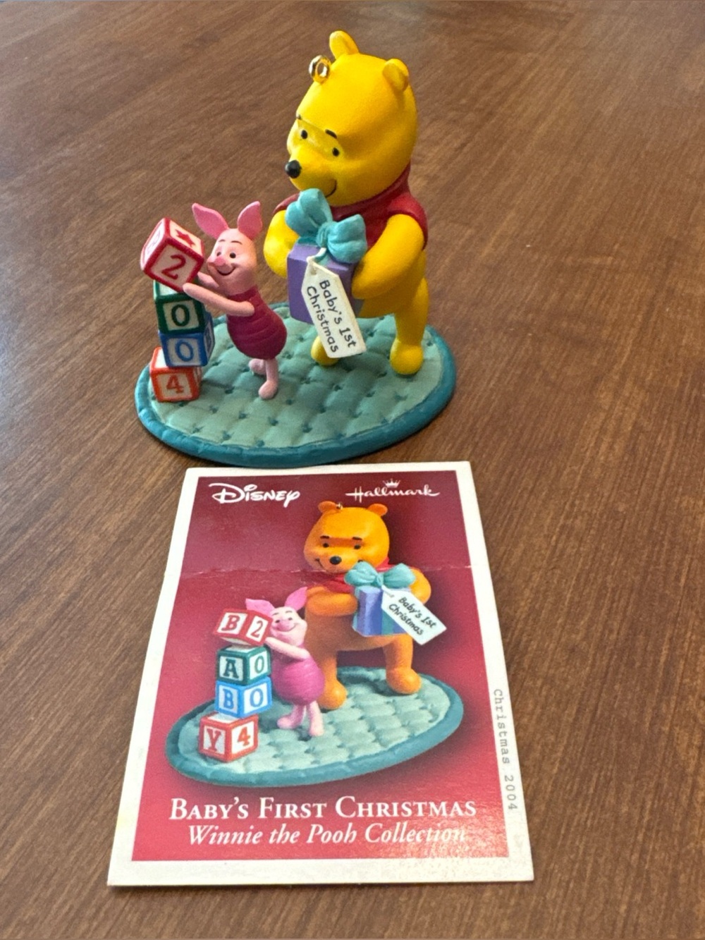 Hallmark Disney Winnie the Pooh Baby's First Christmas ornament - Yellow
